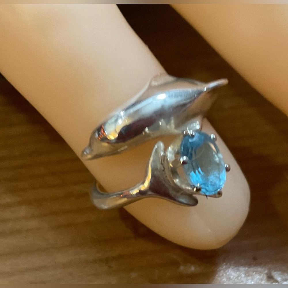 Vintage925 sterling Silver wrap around Dolphin with light blue topaz size 5 ring